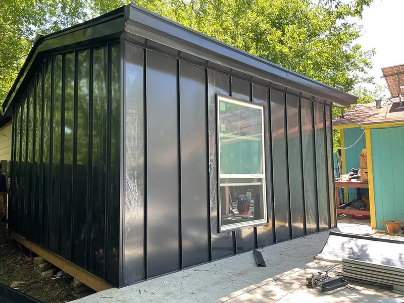 Black standing seam metal wall panels for Metal Roof Installation in Soledad